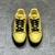 Yellow LV Trainer Sneakers: A pair of Louis Vuitton sneakers in vibrant yellow, perfect for adding a touch of color and style to casual looks.