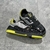 Tênis LV Trainer Crystals Black/Yellow: Tênis preto com detalhes em amarelo e cristais, elegante e moderno, perfeito para quem busca estilo e sofisticação com um toque vibrante de cor.