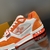 LV Trainer Denim Monogram Flowers Orange Sneakers: A pair of monogram and flower print denim sneakers in vibrant shades of orange, featuring a modern and distinctive style.