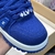 LV Trainer Maxi Blue Sneakers: An elegant casual footwear option in a blue tone, perfect for adding style to any outfit.