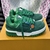 LV Trainer Maxi Green Sneakers: Footwear with a vibrant green hue, ideal for adding a touch of color to your looks. Stylish and comfortable for various occasions.