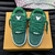 LV Trainer Maxi Green Sneakers: Footwear with a vibrant green hue, ideal for adding a touch of color to your looks. Stylish and comfortable for various occasions.