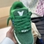 LV Trainer Maxi Green Sneakers: Footwear with a vibrant green hue, ideal for adding a touch of color to your looks. Stylish and comfortable for various occasions.