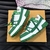 LV Trainer Maxi Green/White Sneakers: Features a vibrant design with a predominance of green and white details, ideal for those looking for style and comfort.