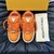 LV Trainer Maxi Orange Sneakers: Sports shoes with vibrant orange details, perfect for an urban and modern style.