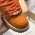 LV Trainer Maxi Orange Sneakers: Sports shoes with vibrant orange details, perfect for an urban and modern style.