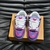 LV Trainer Maxi Purple/Pink Sneakers: Shows a pair of sneakers with a mix of purple and pink, perfect for those looking for vibrant and elegant footwear for any occasion.