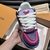 LV Trainer Maxi Purple/Pink Sneakers: Shows a pair of sneakers with a mix of purple and pink, perfect for those looking for vibrant and elegant footwear for any occasion.