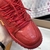 LV Trainer Maxi Croco Red Sneakers: Features an elegant design with an intense red croco finish, ideal for those looking for a sophisticated and contemporary style.