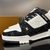 LV Trainer Monogram Denim Black/White Sneakers: These Louis Vuitton sneakers feature black and white monogram denim details for a sleek, contemporary look.