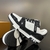 LV Trainer Monogram Denim Black/White Sneakers: These Louis Vuitton sneakers feature black and white monogram denim details for a sleek, contemporary look.