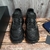 Prada Cloudbust Thunder Black Sneakers: Black sneakers, part of the Cloudbust Thunder line from luxury fashion brand Prada, known for its futuristic and innovative aesthetic.