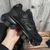 Prada Cloudbust Thunder Black Sneakers: Black sneakers, part of the Cloudbust Thunder line from luxury fashion brand Prada, known for its futuristic and innovative aesthetic.