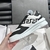 Versace Greca Odissea "Black/White" sneakers: A sports shoe with Versace's Greca design in black and white, ideal for an urban and sophisticated style.