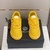 Versace Odissea "Yellow" Sneakers: A vibrant yellow sneaker from Versace's Odissea line, adding a touch of color and style to the look.