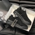 Versace Odissea Crystal "Black" Sneakers: A pair of Versace Odissea Crystal sneakers in black, adorned with crystals, combining style and sophistication.