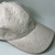 Gorra LV Monogram Shadow": una gorra de Louis Vuitton con el patrón Monogram Shadow, que presenta la firma de la marca en un estilo elegante y discreto.