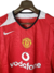 Camisa Retrô Manchester United I 2005 - Masculina Nike - Vermelha com detalhes em preto e branco - comprar online