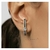 Brinco Ear Hook com Zircônias Negras e Brancas Banhado a Ouro - comprar online