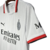 Camisa AC Milan II 24/25 - Torcedor Puma Masculina - Branco com detalhes em vermelho e preto na internet