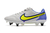 Chuteira Trava Mista Nike Tiempo Legend IX Elite - Branco com detalhes em amarelo e azul - comprar online