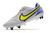 Imagem do Chuteira Trava Mista Nike Tiempo Legend IX Elite - Branco com detalhes em amarelo e azul