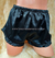 DELT SHORT SATEN CON VOLADOS NEGRO SHORTN - LENCERIA CATAMARCA MAYORISTA