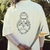 Camiseta Oversized Omolu Off White