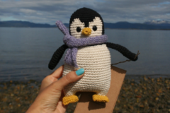 Pingüino con bufanda en internet
