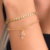 Pulseira Dupla Cruz Cravejada Banho Ouro 18k