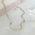 Choker Folha Minimalista Ródio Branco na internet