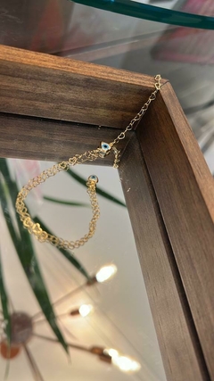 Pulseira olho Grego com detalhe no fecho de Coração Banhado em Ouro 18 K na internet