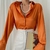 "Encanto Nostálgico: Blusa Vintage de Botões, Elegância Streetwear com um Toque Feminino" - comprar online