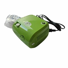 Nebulizador de compresor de pistón Medineb-04 de color verde, diseñado para equipo respiratorio.