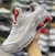 Shox R4 Supreme Branco com Vermelho na internet