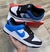 SB Dunk Low-Branco com Preto e Azul