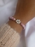 Pulsera de hilo. Flor Fimo. - comprar online