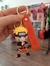 Llavero de Naruto Uzumaki con diseño de figura en color naranja y amarillo.