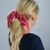 Scrunchie com Laço Listrado em Vermelho e Branco na internet