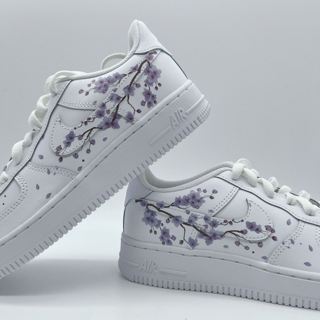 Nike air forces with butterflies 2024 on them