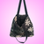 EcoBag - Preta Floral Chic - Reforçada com bolso interno com ziper na internet