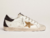 golden-goose-super-star-ltd-with-gold-star-and-black-glitter-heel