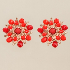 18k gold-plated earring, embroidered with red crystals.