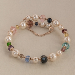 18k gold-plated bracelet, embroidered with pearls and colored crystals.