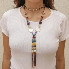 Necklace made from brown waxed thread, embroidered with natural stones and mixed colored crystals.