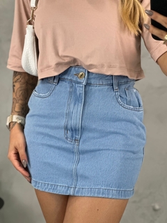 Saia jeans básica detalhes no bolso - comprar online