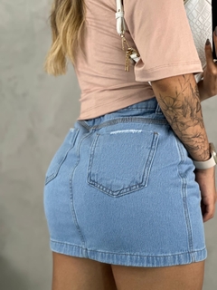 Saia jeans básica detalhes no bolso na internet