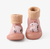 Calcetines con suela de goma rosa con diseño de dinosaurio