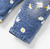 Pantalón de Mezclilla con flores en internet