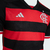 Camisa I Flamengo 24/25 Torcedor Adidas Masculina nas cores preto e vermelho, com listras horizontais e escudo do clube.